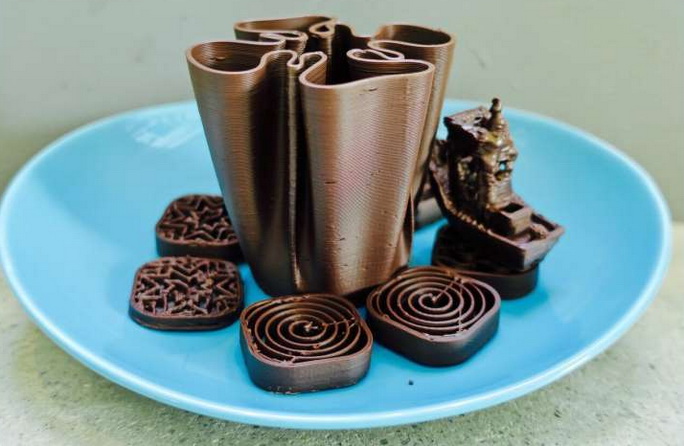 Шоколадные фигурки, приготовленные на 3D-принтере